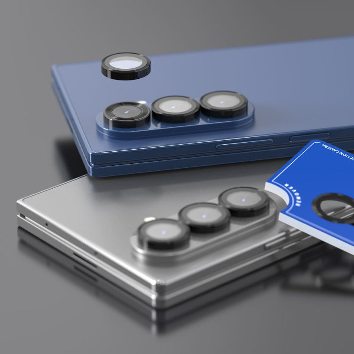 Two smartphones, one blue and one silver, with Araree Core Camera Metal Frame Lens Protector for Samsung Galaxy Z Fold 7 (2025) on a gray surface.