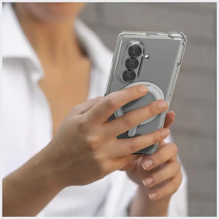 Person holding a smartphone with a Clear Araree Nukin 360 S Case for Samsung Galaxy Z Fold 7 (2025), blurred background