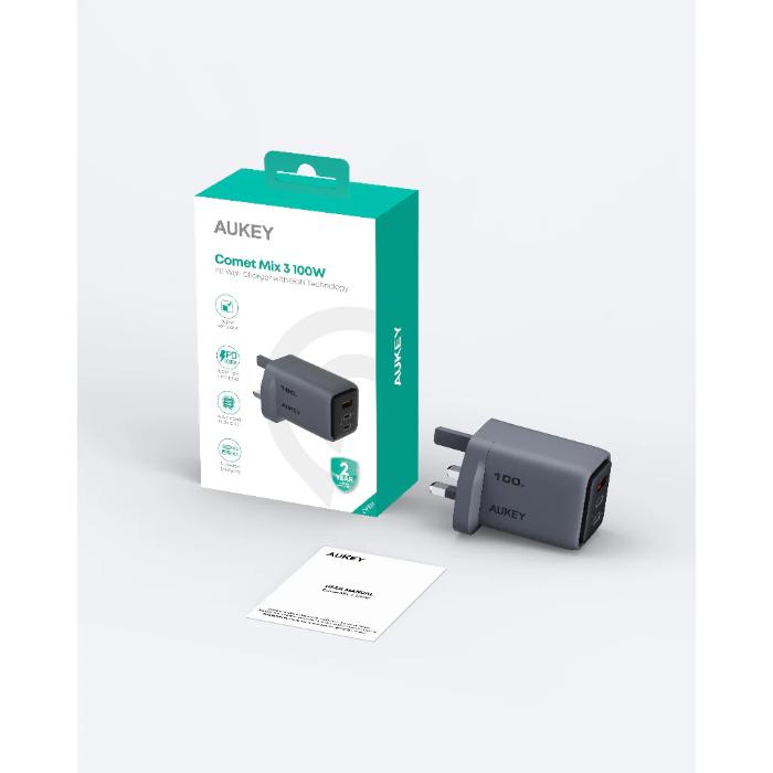 Gray Aukey PA-C5 Comet Mix 3 100W PD Wall Charger with GaN Technology with packaging and user manual on a white background