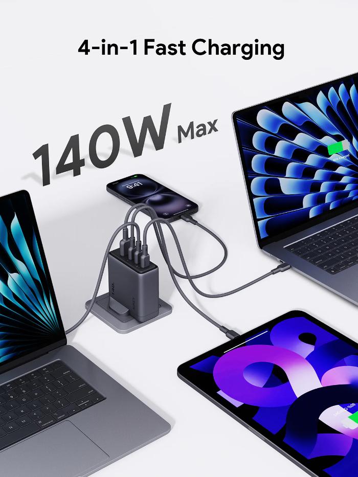 4-in-1 Gray Aukey PA-C6 Comet Mix 4 140W PD Wall Charger with GaN Technology with multiple devices connected on a white background