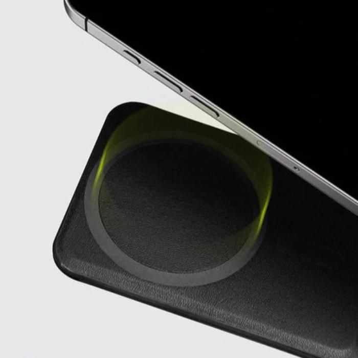 Smartphone with a Bitplay Magnetic Ultra Slim Wallet Stand on a light gray background