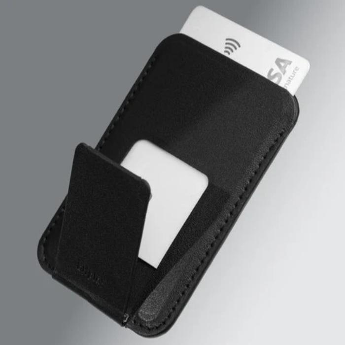 Black Bitplay Magnetic Ultra Slim Wallet Stand with cards on a gray background