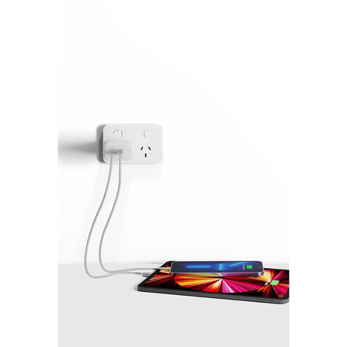 White Cygnett PowerPlus 35w Dual USB-C Fast Charging Wall Charger charging a phone on a white background