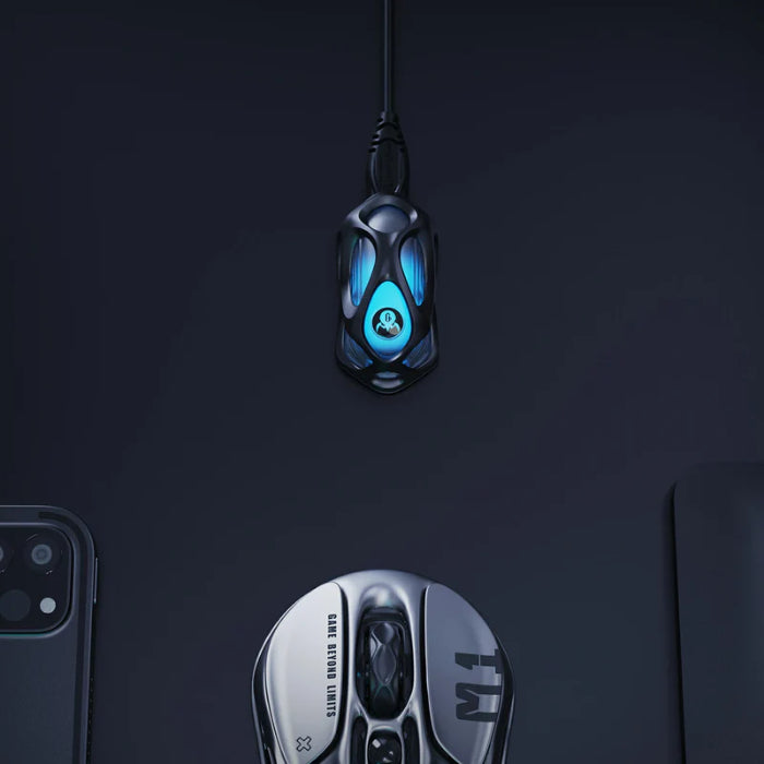 Gaming mouse with GravaStar Mercury M1 Pro 4K Wireless Dongle on a dark background