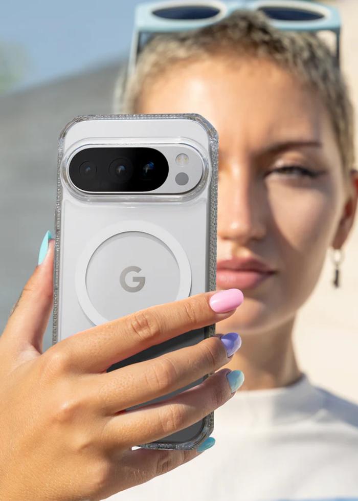 Person holding a smartphone with Transparent ITSKINS Hybrid R Clear Magnetic Case for Google Pixel 10 Pro XL (2025), outdoors.
